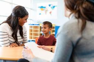 Registered behavior technicians working with a child